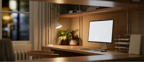 A mini desk lamp on a table