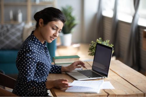 Girl planning on her laptop