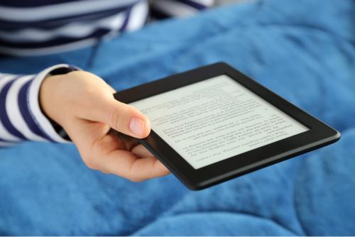 Person reading a kindle 