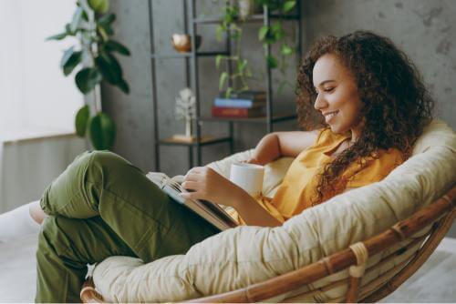 Girl reading books for motivation 