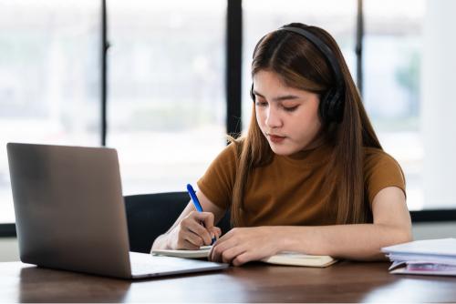 Girl researching on how to adjust to a new country