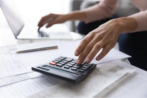 Person calculating the budget