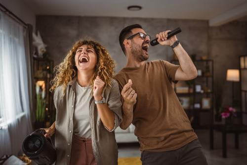 two people doing karaoke